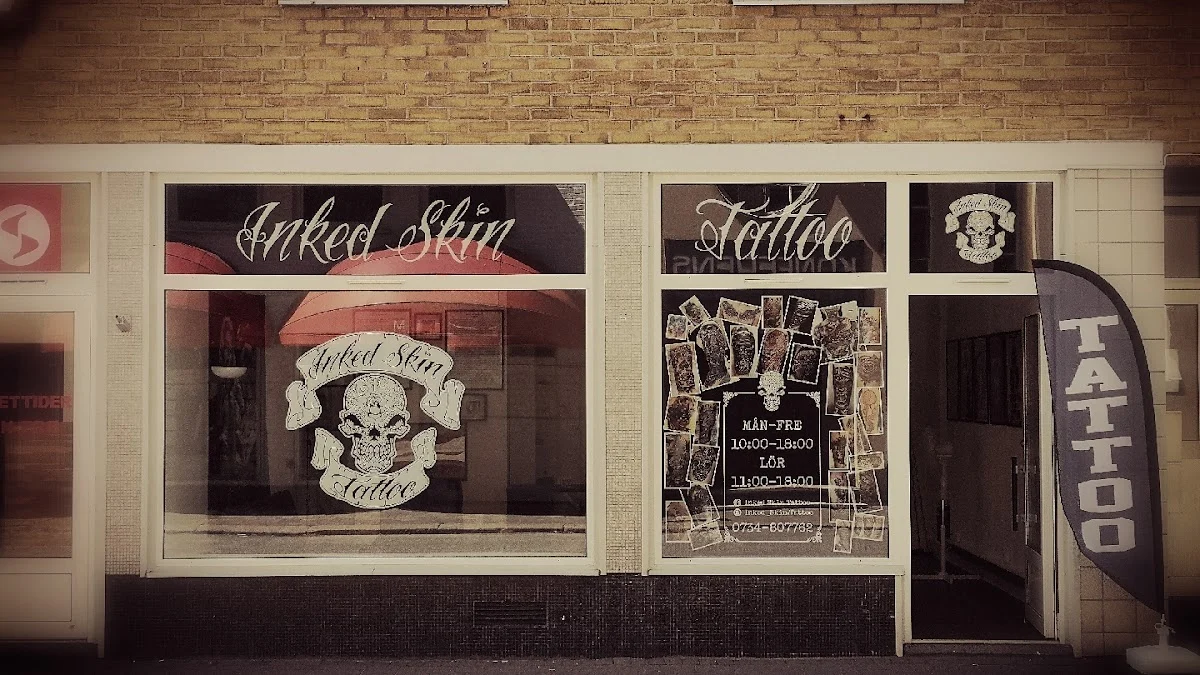 Inked Skin Tattoo